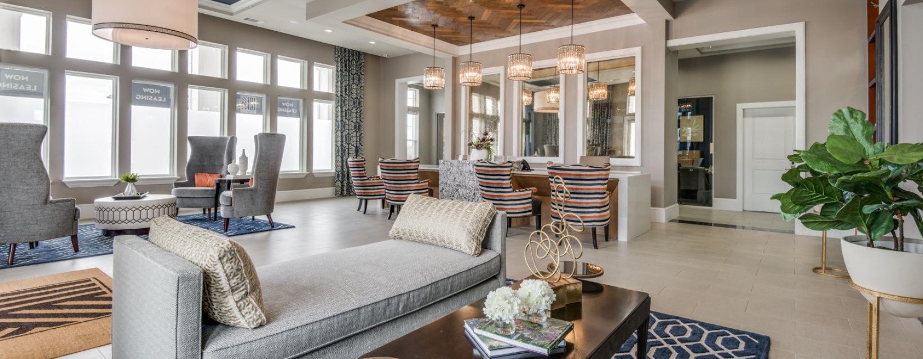 a living room with a large glass wall